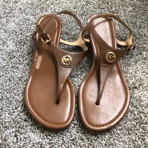 Michael kors size 9 little scuff on shoe from sticky lable otherwise excellent